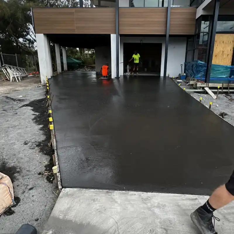 Full depth coloured plain concrete driveway in Coffs Harbour