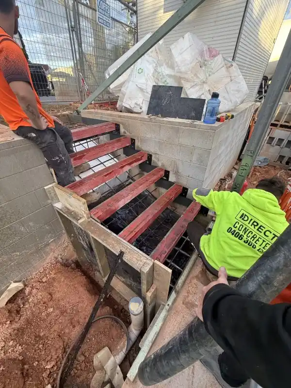 Direct Concrete Team working on LVL footpath formwork in Woolgoolga